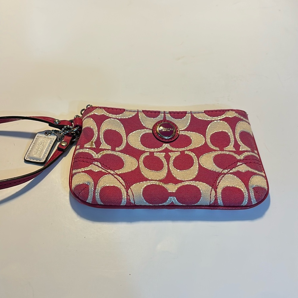 Coach wristlet pink and tan hot pink interior